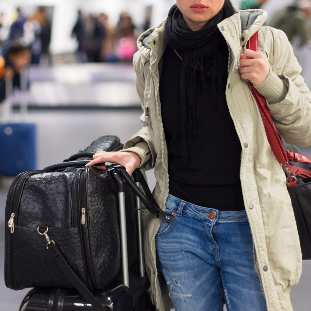 woman with Weekender Bag in Airport