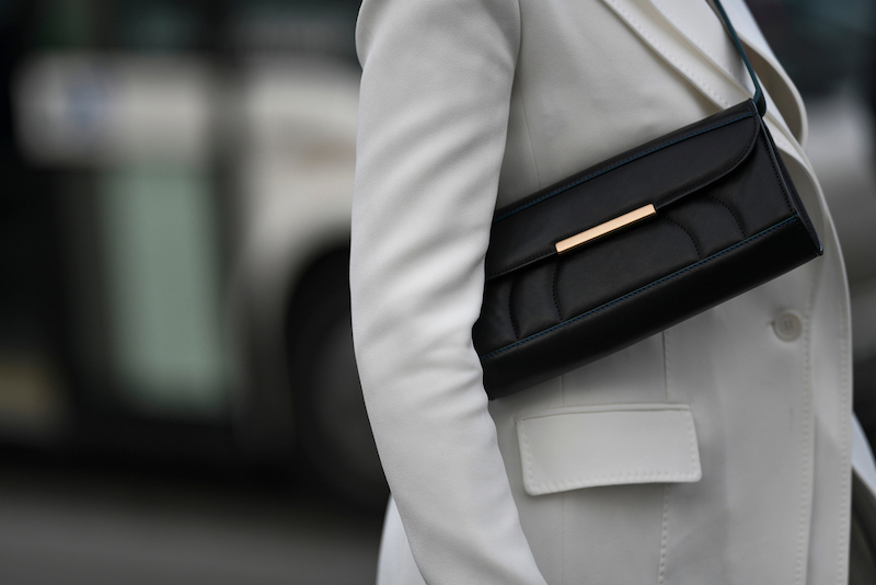 woman carrying shoulder bag