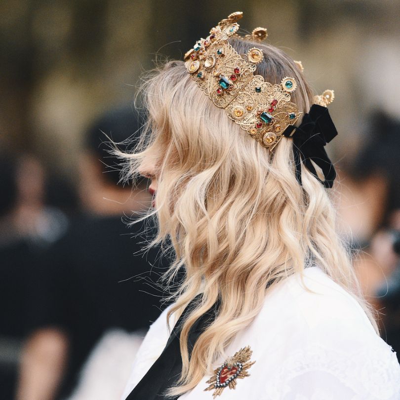blonde woman wearing a crown