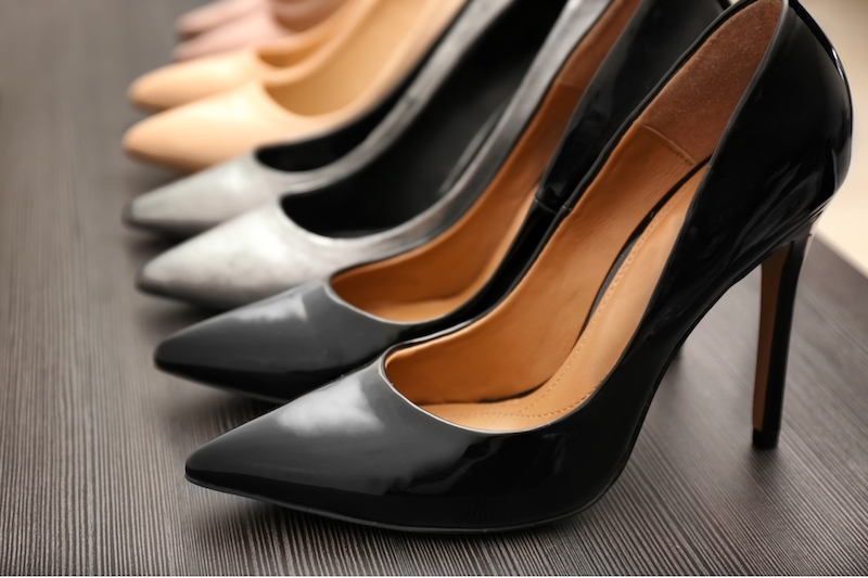 high heel shoes lined up on floor