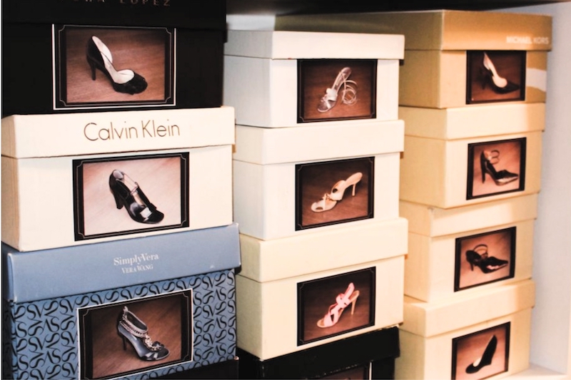 Shoes in their boxes with photos on them