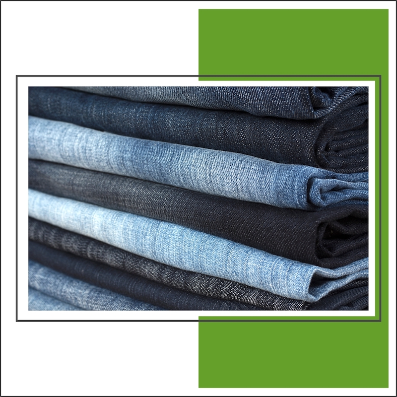 different colored denim jeans folded together
