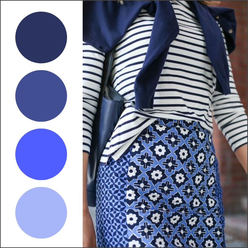 navy and white striped shirt with navy and blue patterned skirt